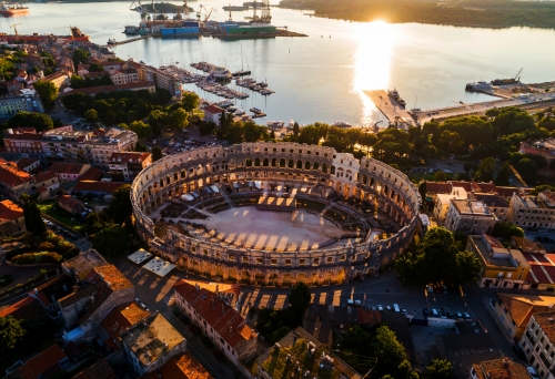 Pula Arena at sunset - HDR aerial view taken by a professional drone. The Roman Amphitheater of Pula, Croatia