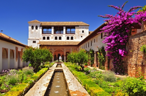 Fountain and gardens in Alhambra palace, Granada, Andalusia, Spain.