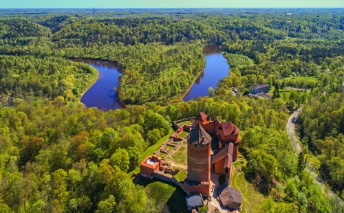 Beautiful aerial view of medieval Turaida castle at Gauja river valley, Sigulda, Latvia