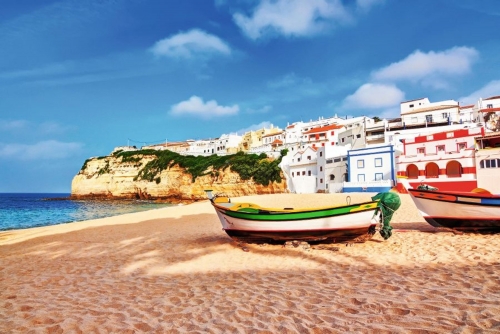 Portuguese beach villa in Carvoeiro classic fishing boats. Summe