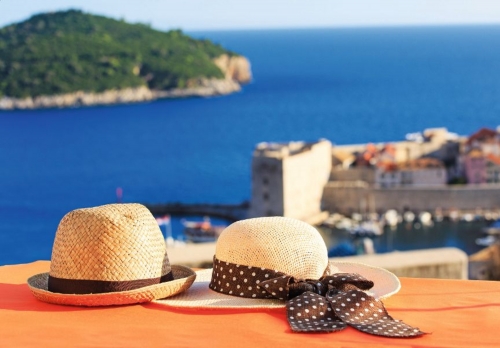 two hats on vacation in Europe