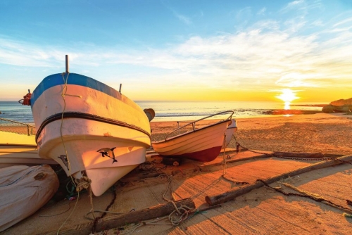 Boats in warm sunset light on the Fisherman